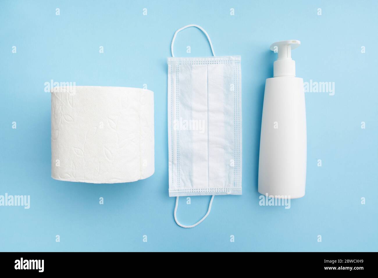 Hygiene supplies antiseptic gel, medicine mask, and toilet paper rolls ...
