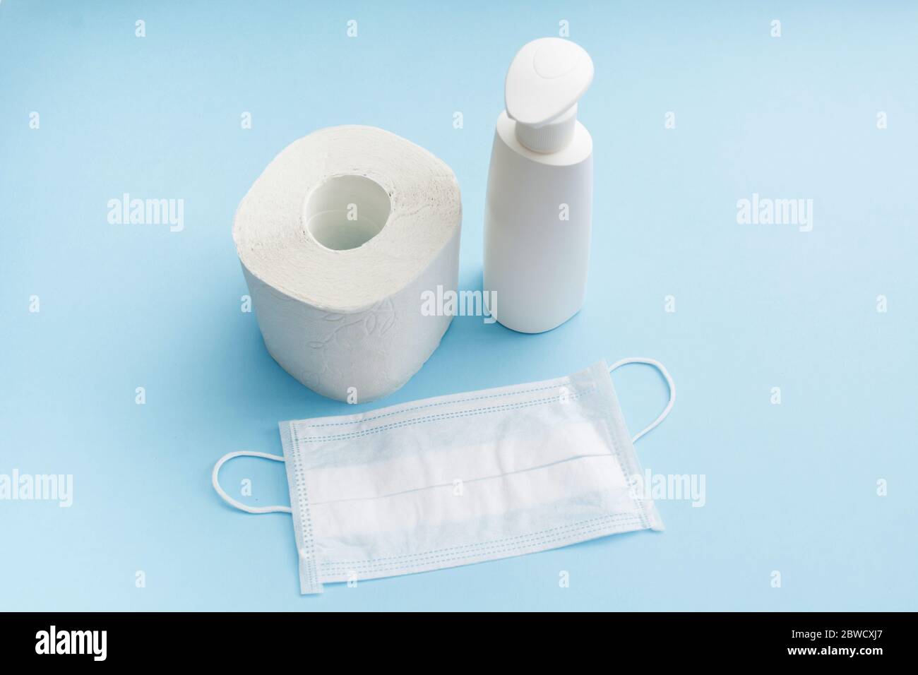Hygiene supplies antiseptic gel, medicine mask, and toilet paper roll ...