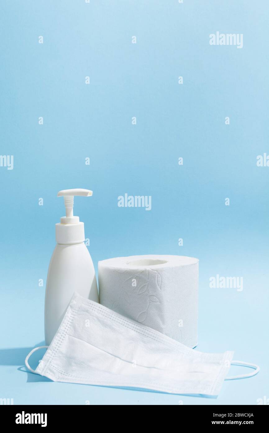 Hygiene supplies antiseptic gel, medicine mask, and toilet paper roll ...