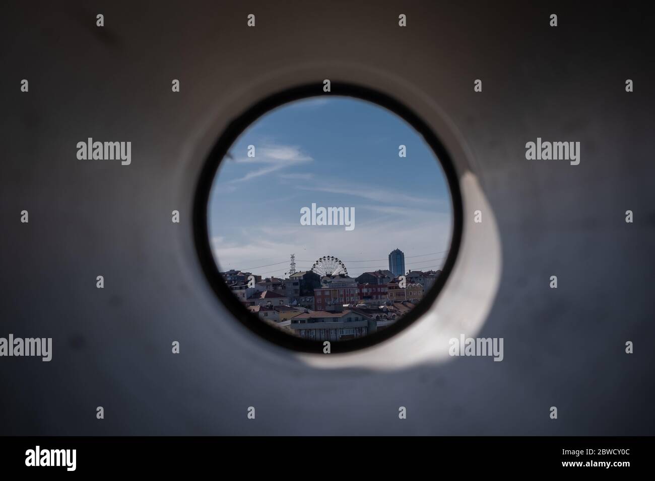 Look at the ferris wheel through the plastic pipe Stock Photo Alamy