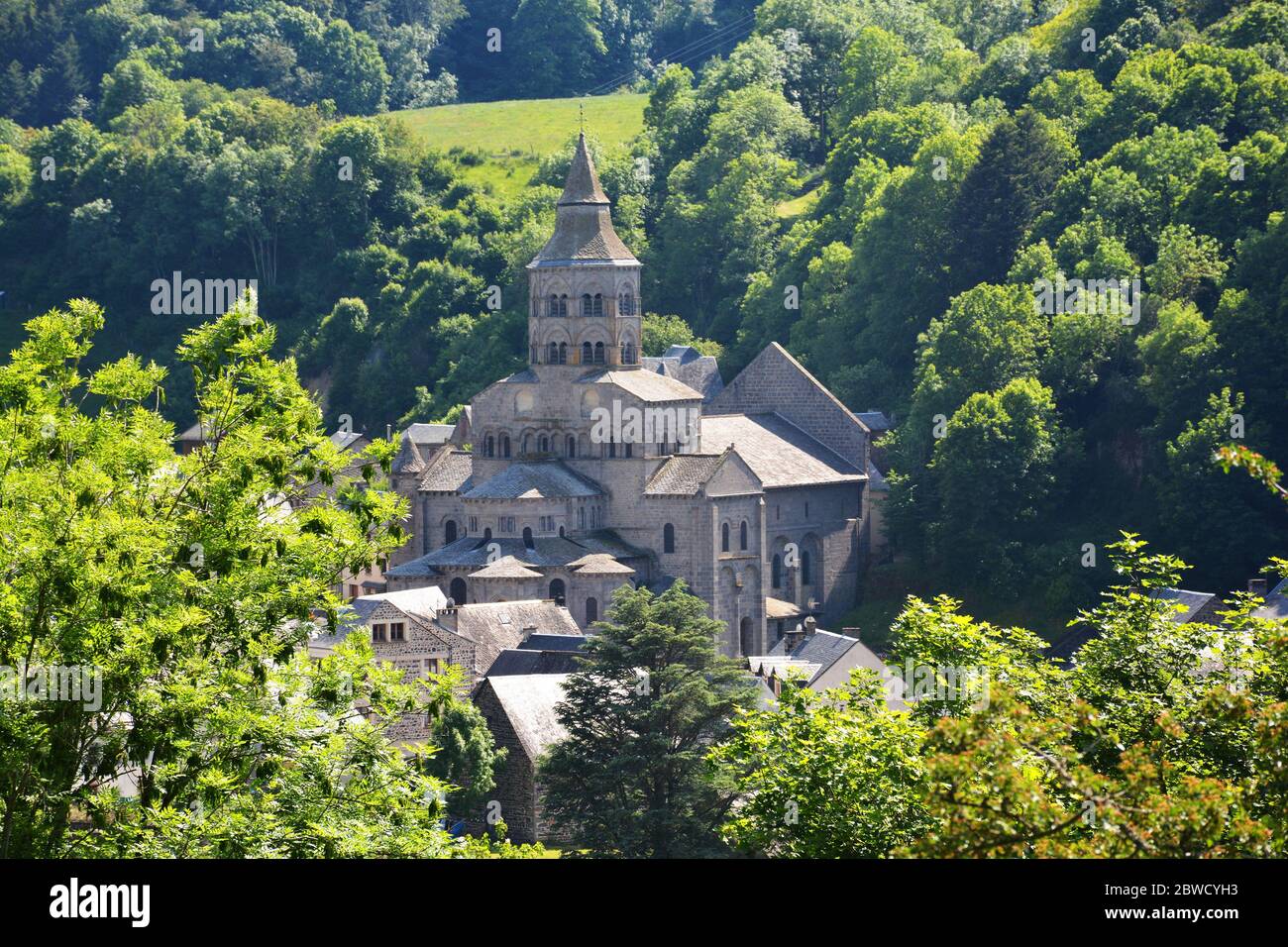roman church, Parc naturel regional des volcans d'Auvergne, Orcival, Puy-de-Dome, Auvergne, Massif-Central, France Stock Photo