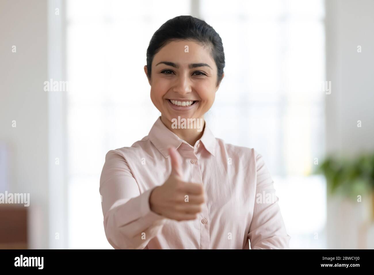 Indian woman thumbs up sign hi-res stock photography and images - Alamy