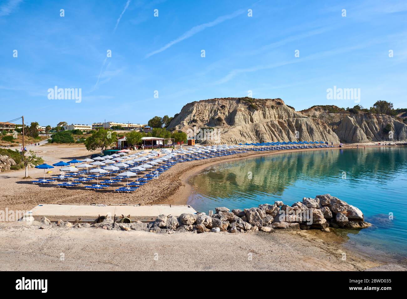Kolymbia beach with sun loungers on Rhodes island. Greece Stock Photo