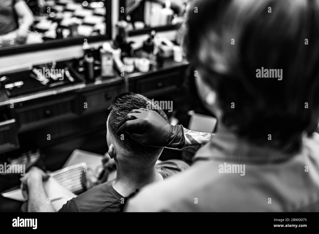 Black and white photo of a men's haircut Stock Photo - Alamy