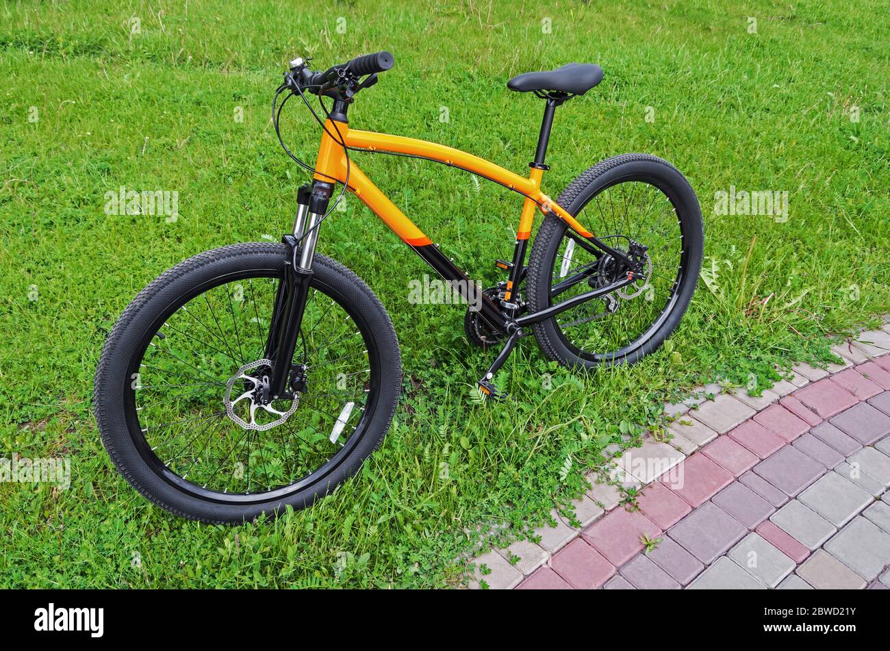black and orange bicycle