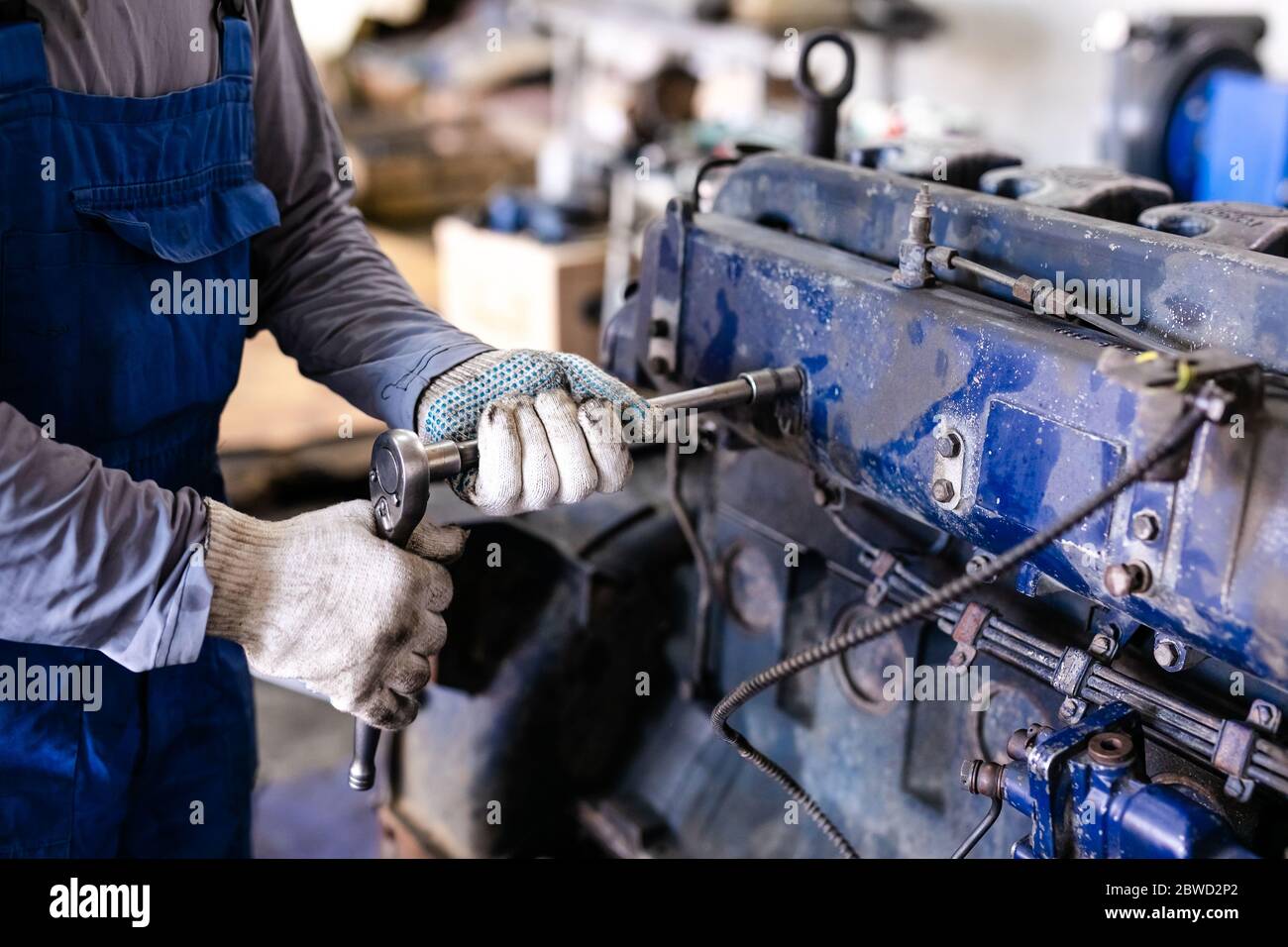 Different mechanical tools for auto service and car and truck repair. Old motor capital repair
