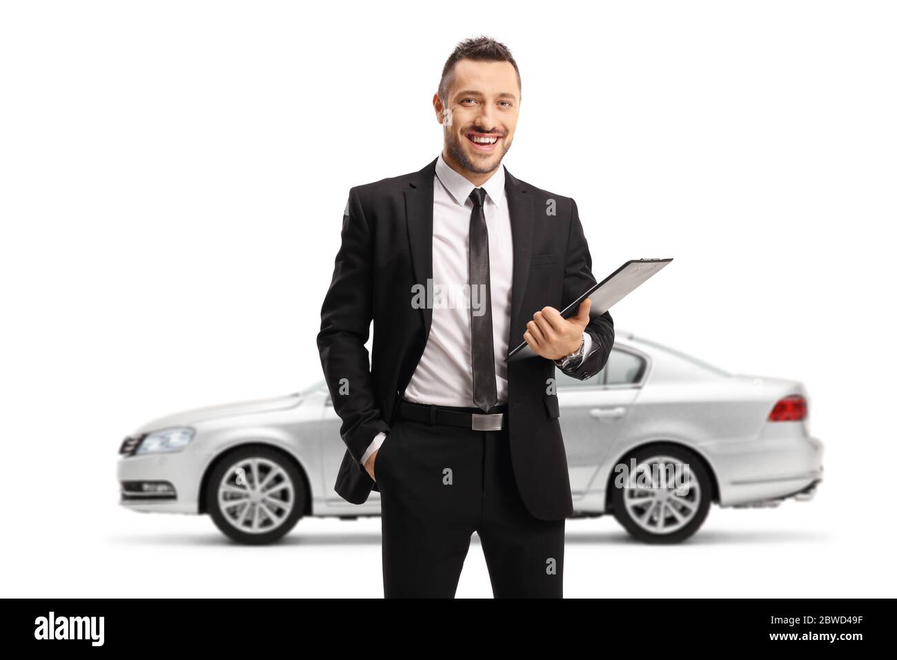 silver car and a man in a black suit posing isolated on white background stock photo alamy alamy