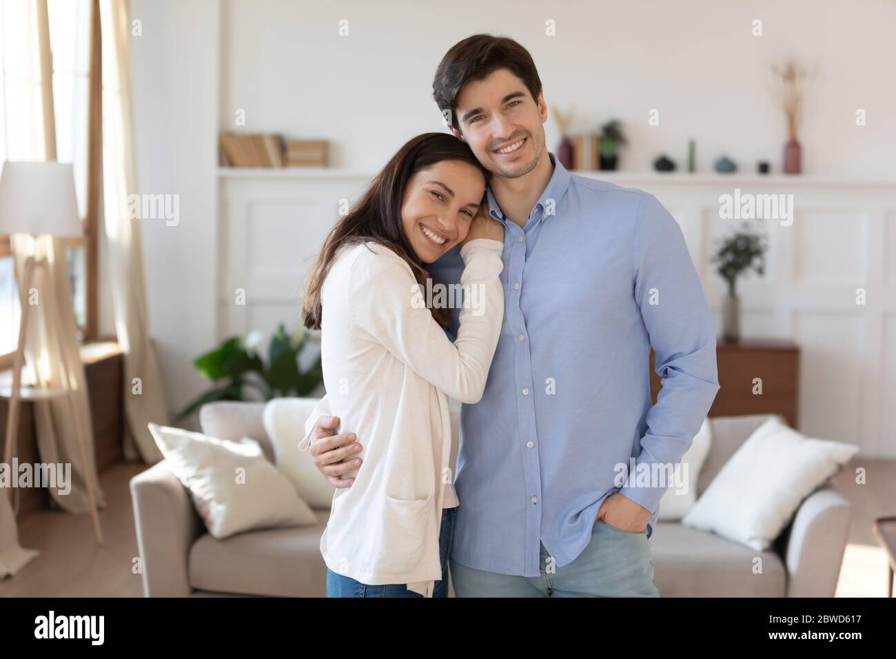 Happy married couple stand in hi-res stock photography and images - Alamy