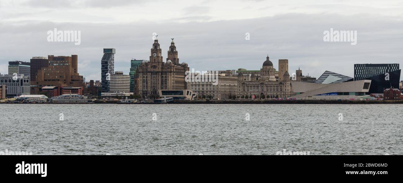 Liverpool, UK: Oct 1, 2017: A general scenic view of the buildings on the Liverpool Waterfont seen from the opposite bank of the River Mersey. Stock Photo