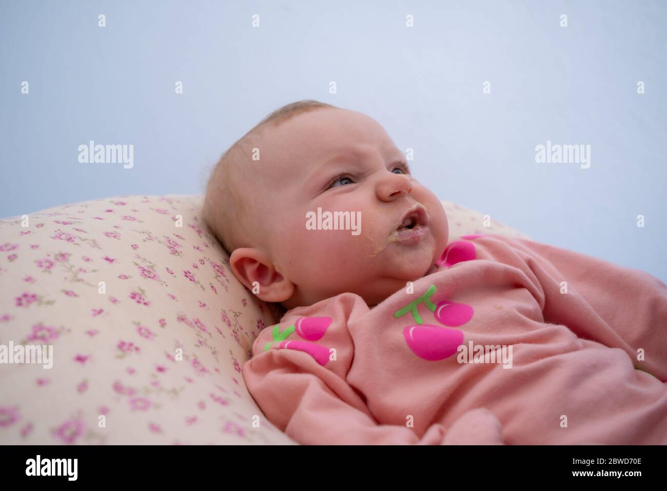 Little baby girl does not want to eat food. Cute baby girl makes angry