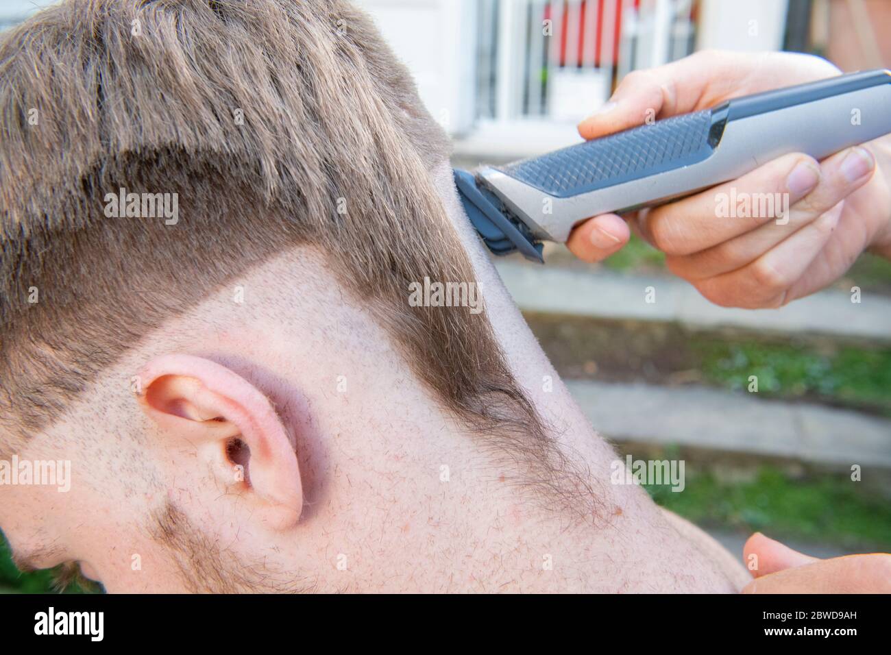 Side shaved haircut hi-res stock photography and images - Alamy
