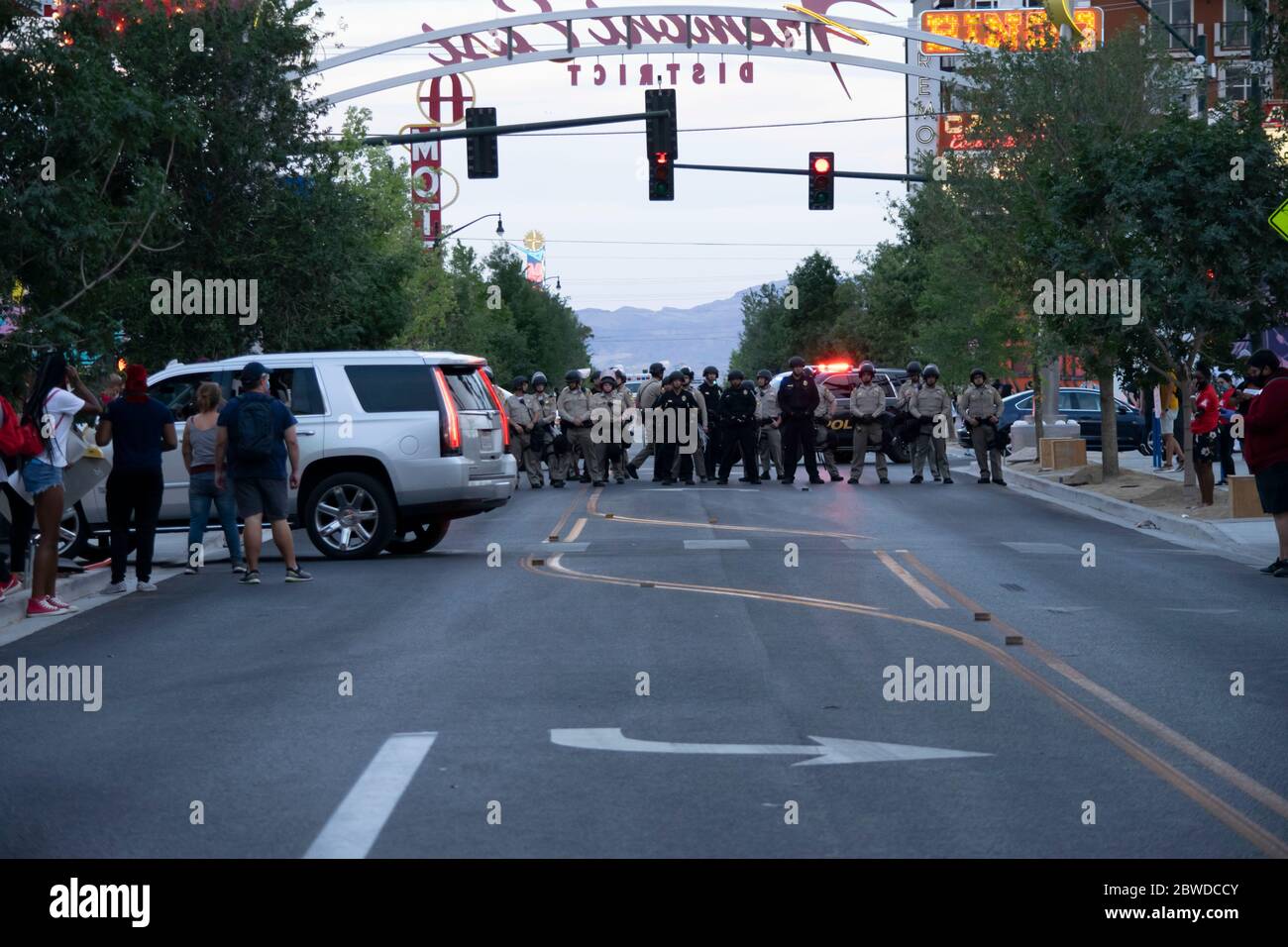 Las Vegas, NV - May 30, 2020: Law enforcement make a human road block barricade line as the protesters gather to protest and march in a nationwide call for changes in the police departments across the country on May 30, 2020 in downtown Las Vegas, Nevada. Credit: Shannon Beelman/The Photo Access Stock Photo