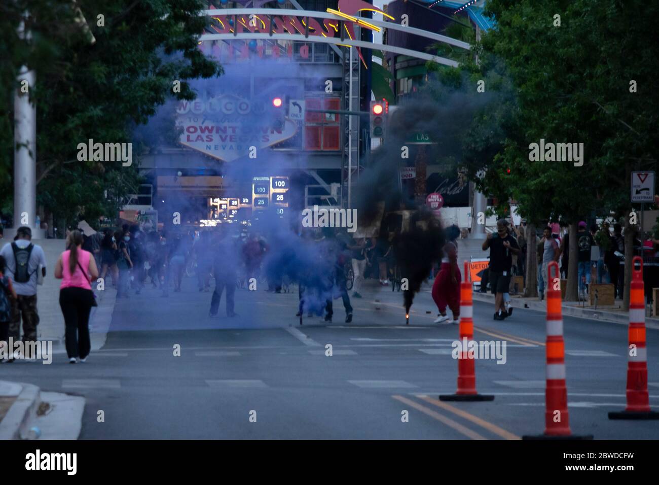 Las Vegas, NV - May 30, 2020: Smoke fills Fremont Street as protesters gather to protest and march in a nationwide call for changes in the police departments across the country on May 30, 2020 in downtown Las Vegas, Nevada. Credit: Shannon Beelman/The Photo Access Stock Photo