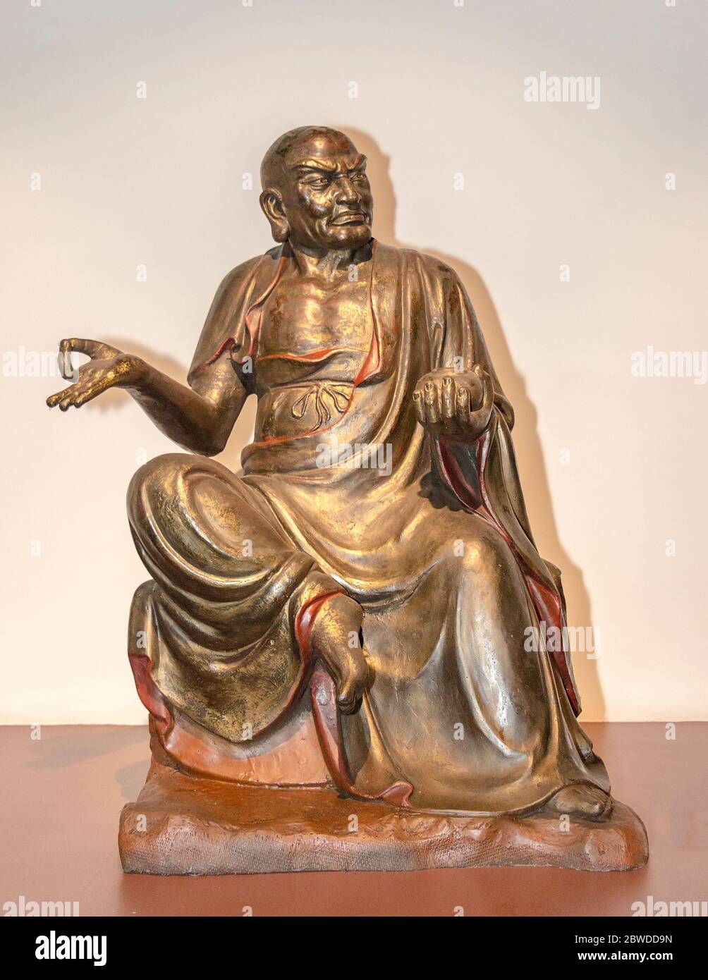 Statue of arhat, in Buddhism someone who has either achieved enlightenment or is working towards it. On disiplay, Zhen Qi Hui Art Center in Hangzhou Stock Photo