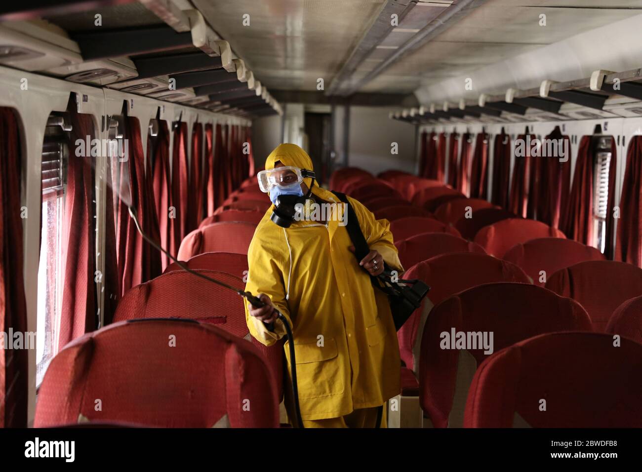 Cairo, Egypt. 31st May, 2020. A worker sprays disinfectant in a train in Cairo, Egypt, on May 31, 2020. Egypt reported on Sunday a new record of 1,536 COVID-19 daily infections, raising the total number of cases registered in the country to 24,985, the Egyptian Health Ministry said. Credit: Ahmed Gomaa/Xinhua/Alamy Live News Stock Photo