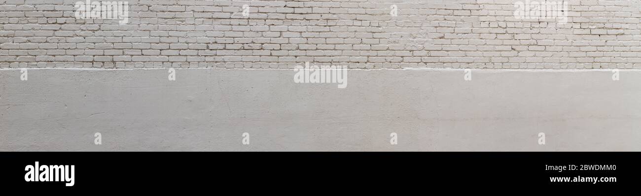 Extra wide panoramic background split between white painted brick and white painted stucco textures, creative copy space, horizontal aspect Stock Photo