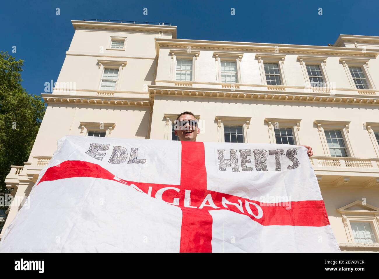 English Defence League (EDL) members on  a March organised by group calling itself 'British Citizens Against Muslim Extremists'. The protest is about Stock Photo