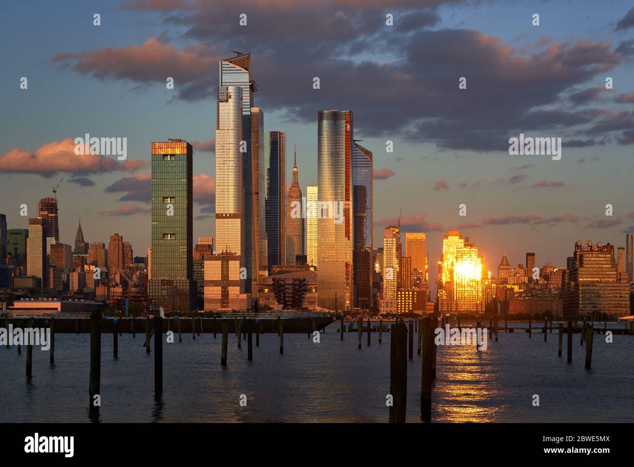 The newly developed Hudson Yards skyscrapers at Sunset. Manhattan Midtown West cityscape from across the Hudson River, New York City, NY, USA Stock Photo