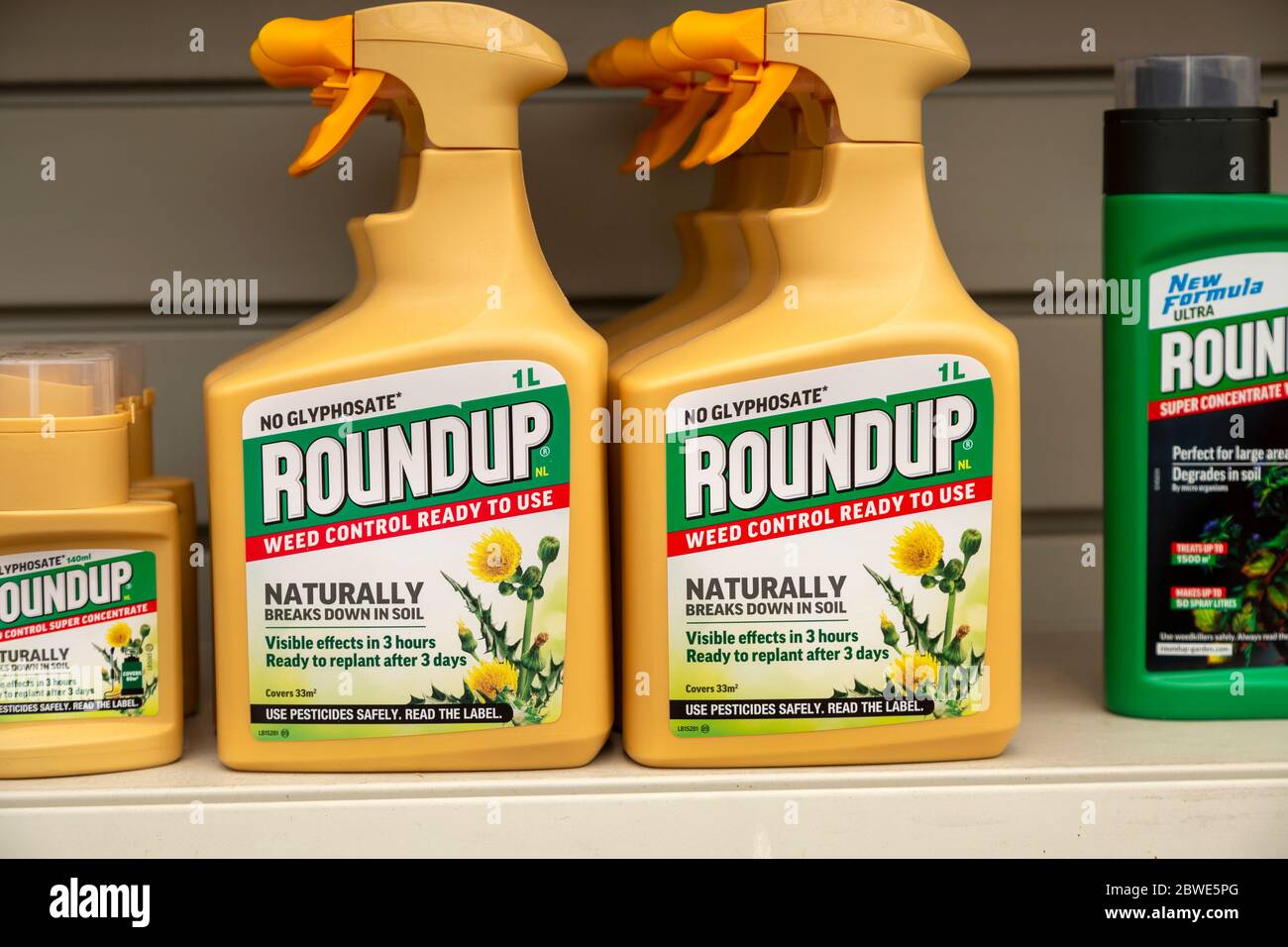 Plastic containers Roundup no Glyphospahte weed killer spray on shelf