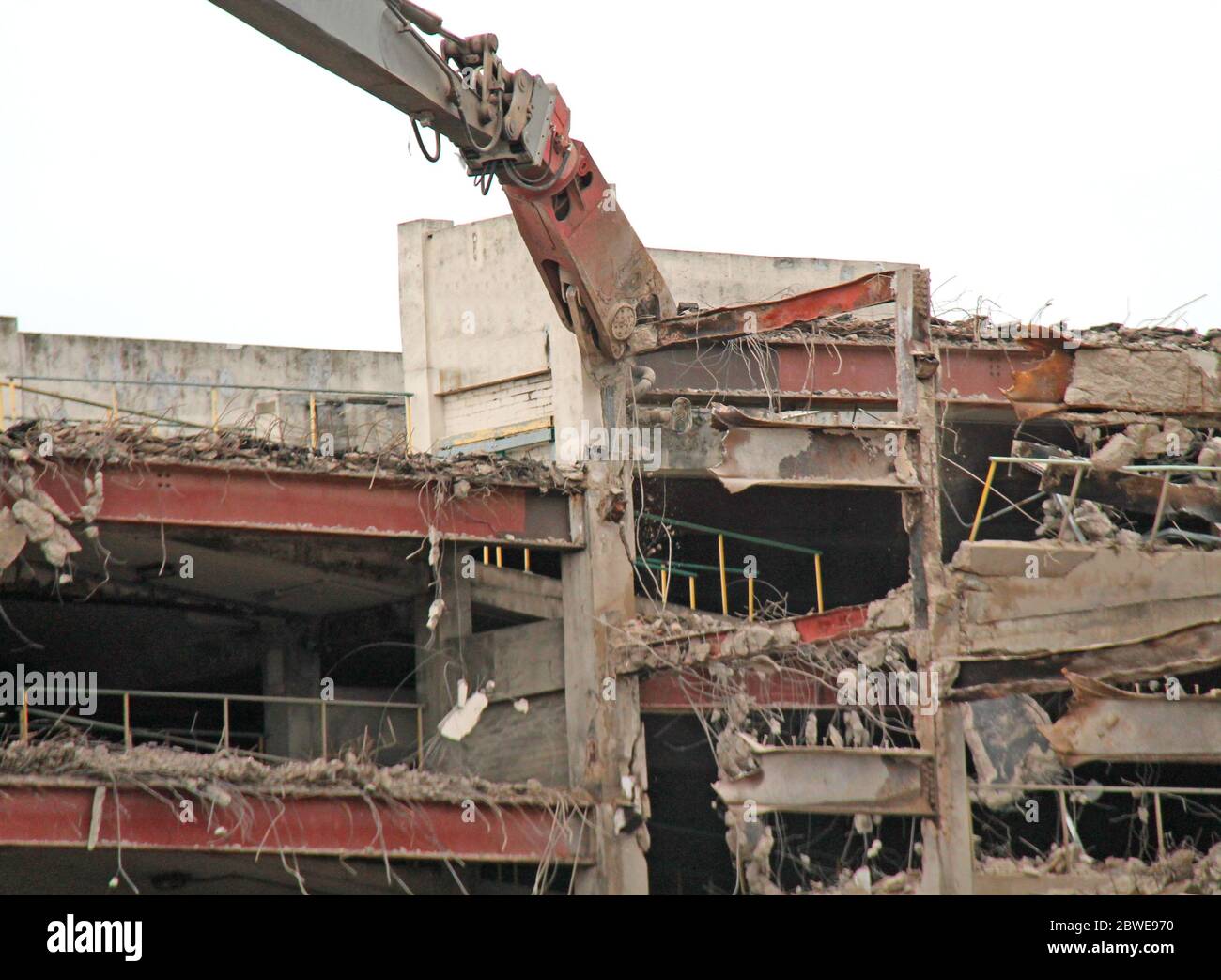 Debris Being Pulled from a Building Demolition Site. Stock Photo
