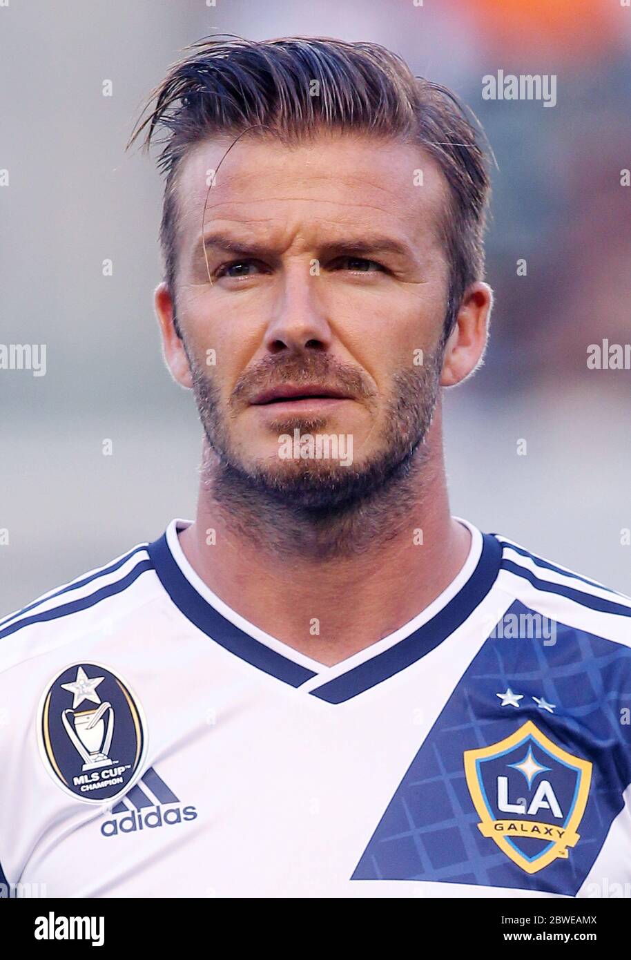 David Beckham kicking football during game, February 2011 Stock Photo