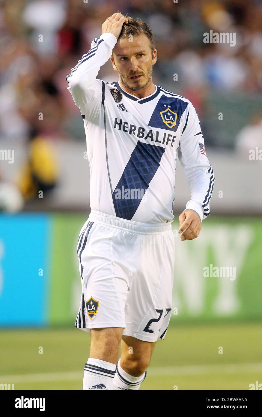 David Beckham kicking football during game, February 2011 Stock Photo ...