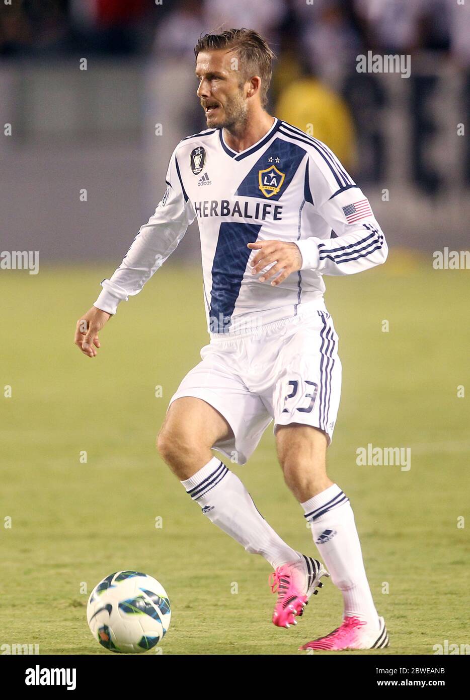 David Beckham kicking football during game, February 2011 Stock Photo ...
