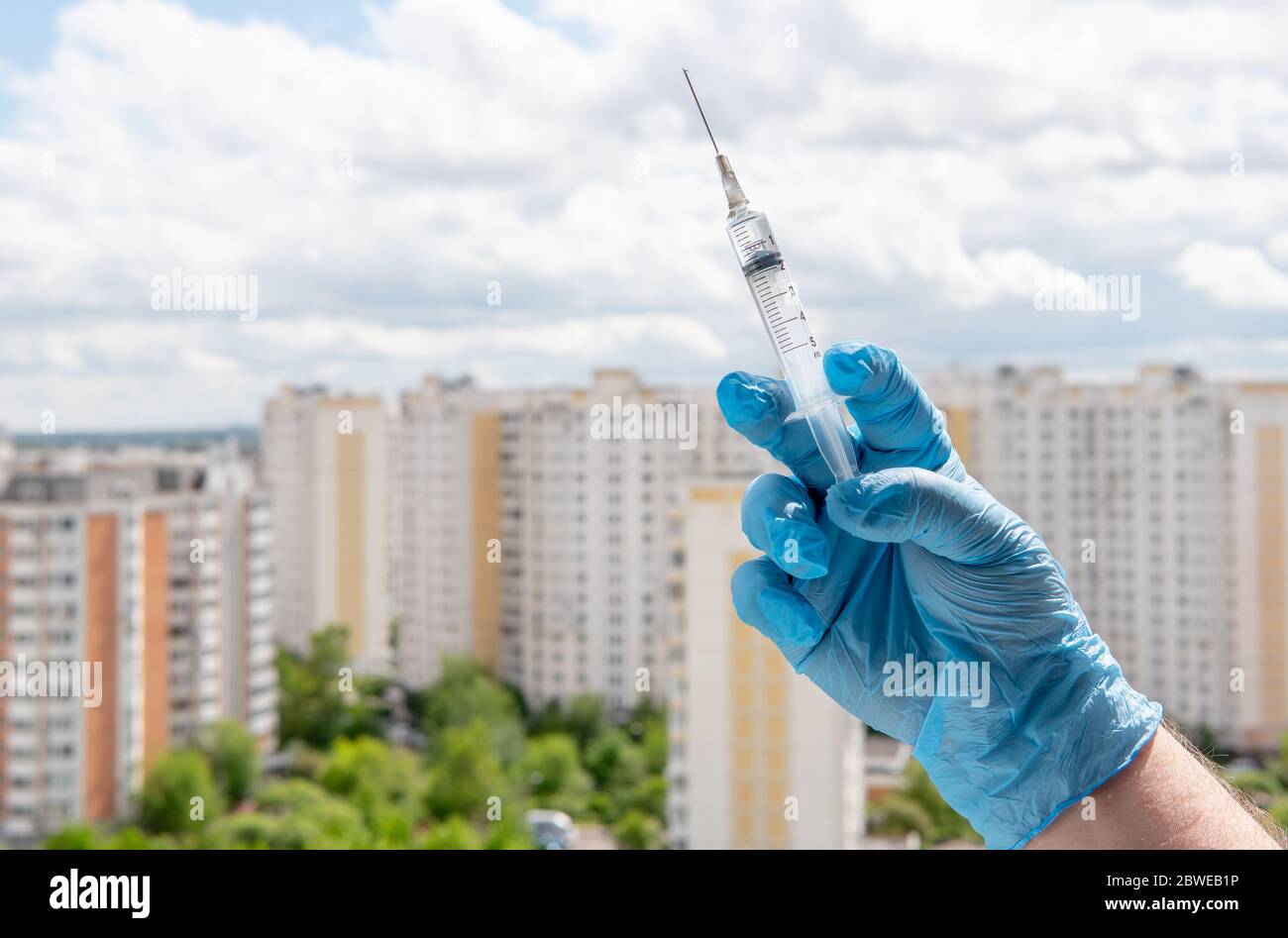 Hand in medical glove hi-res stock photography and images - Alamy
