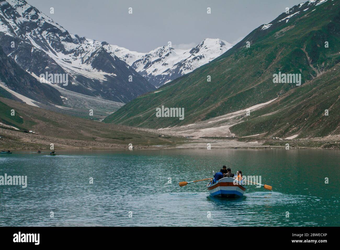 Tourist Boating At Saif ul Maluk Lake, Naran Valley, Khyber Pakhtunkhua, Pakistan 6/26/2018 Stock Photo