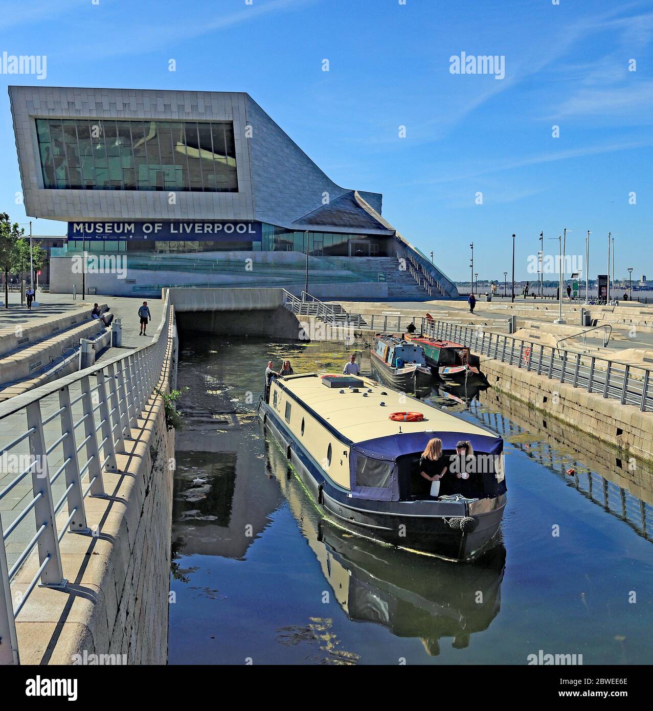 On the 29.5.2020 three canal boats, with the permission and arranged with the CRT left the docks in Liverpool, passing under the Museum of Liverpool Stock Photo