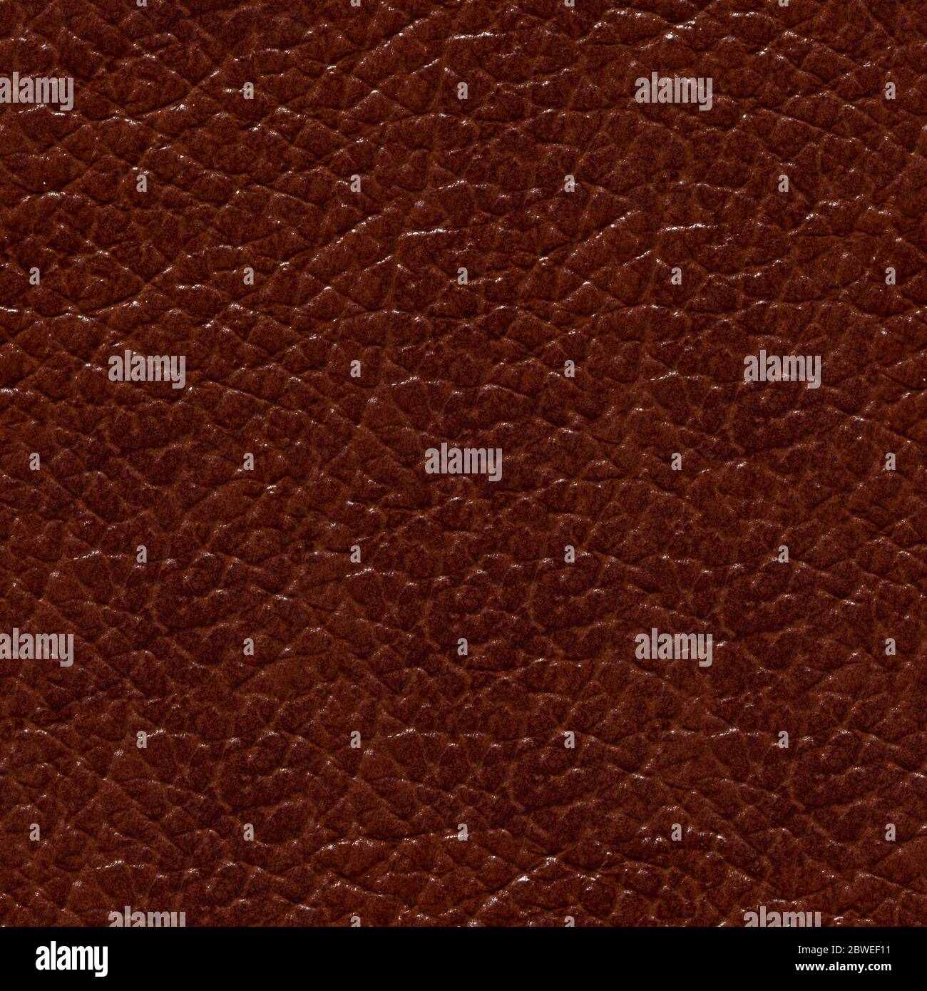 Leather background in expensive brown colour. Stock Photo