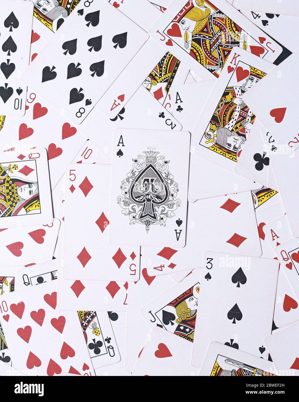 Playing Cards Background - So many playing cards on the floor Stock Photo