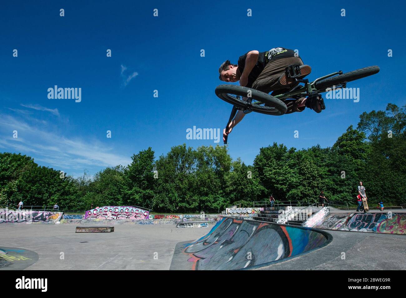 man on BMX bike at Kelvingrove Park skatepark, Glasgow, Scotland, UK Stock Photo