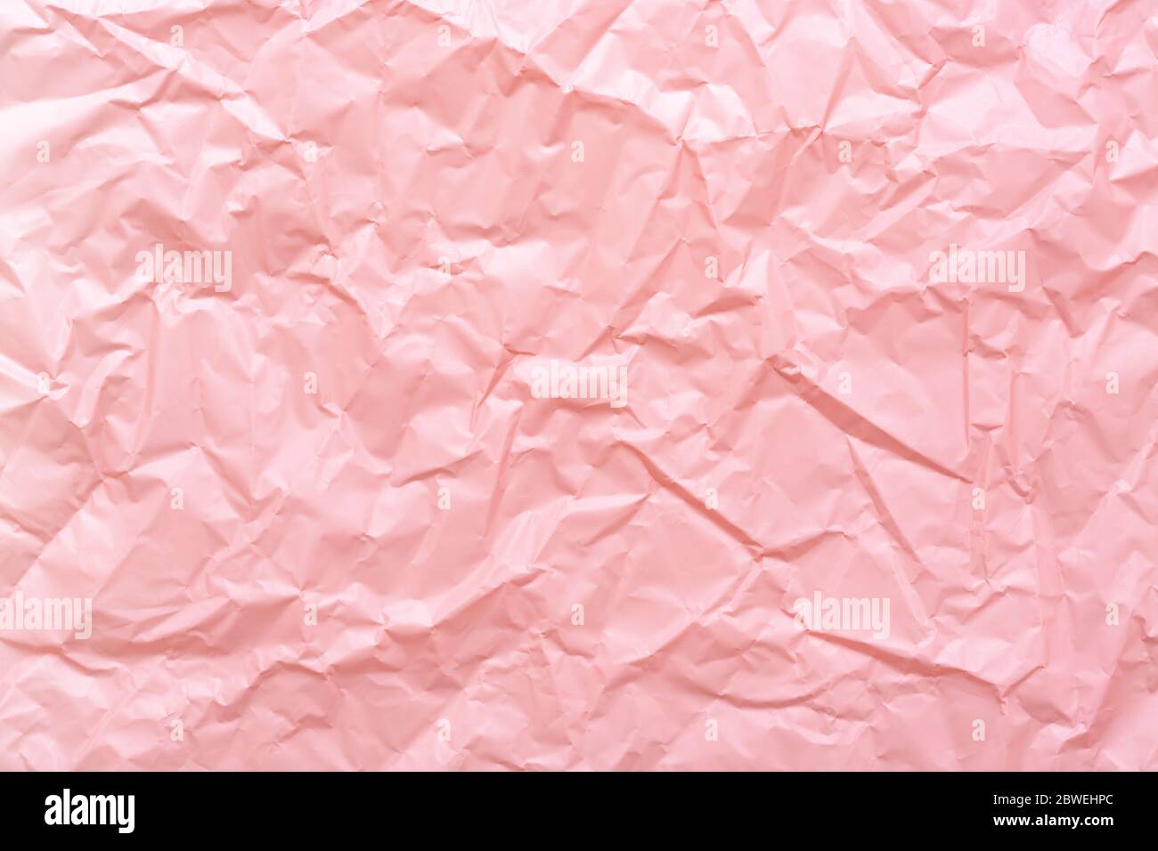 crumpled pink paper texture background Stock Photo - Alamy