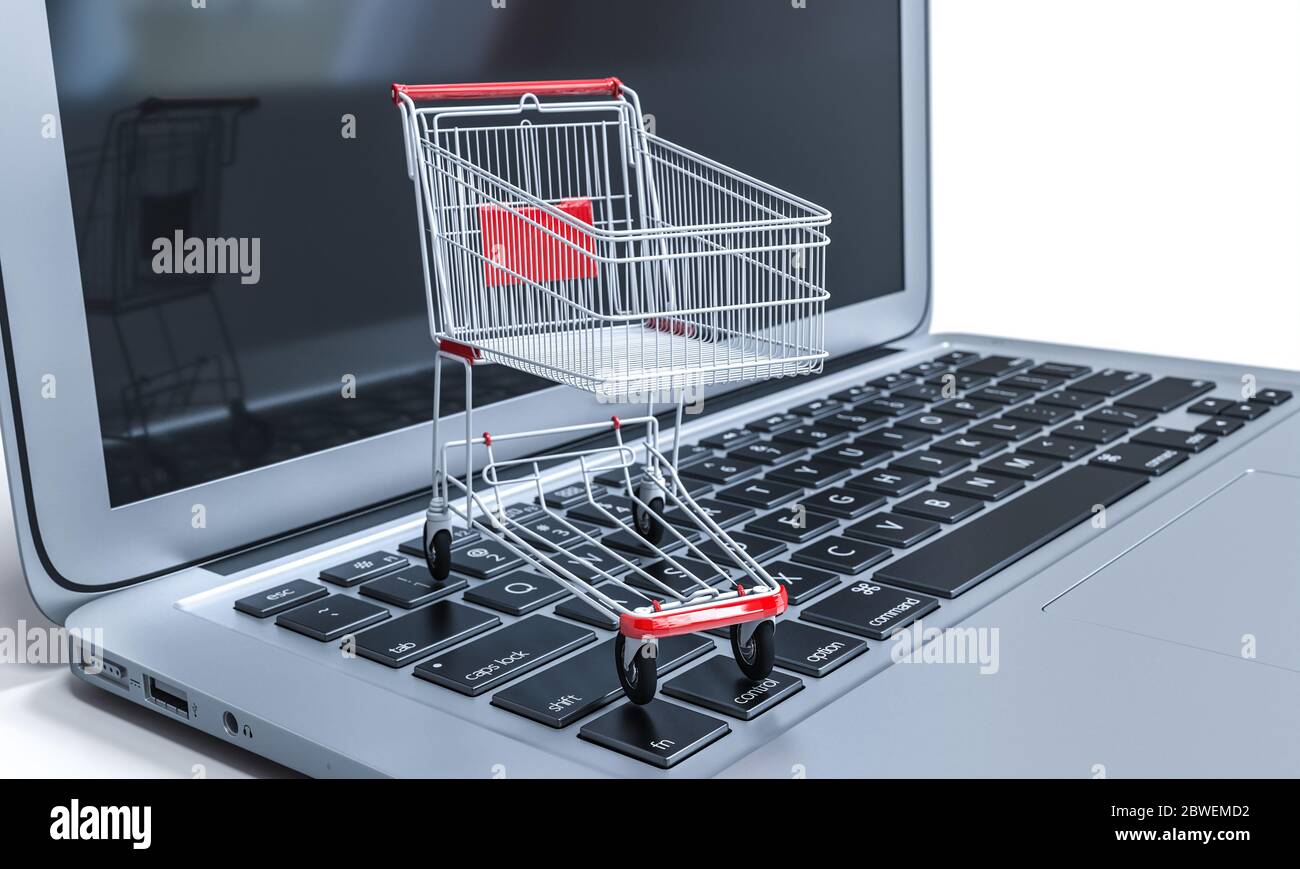 empty shopping cart on a laptop keyboard. 3d render. online shopping concept. Stock Photo
