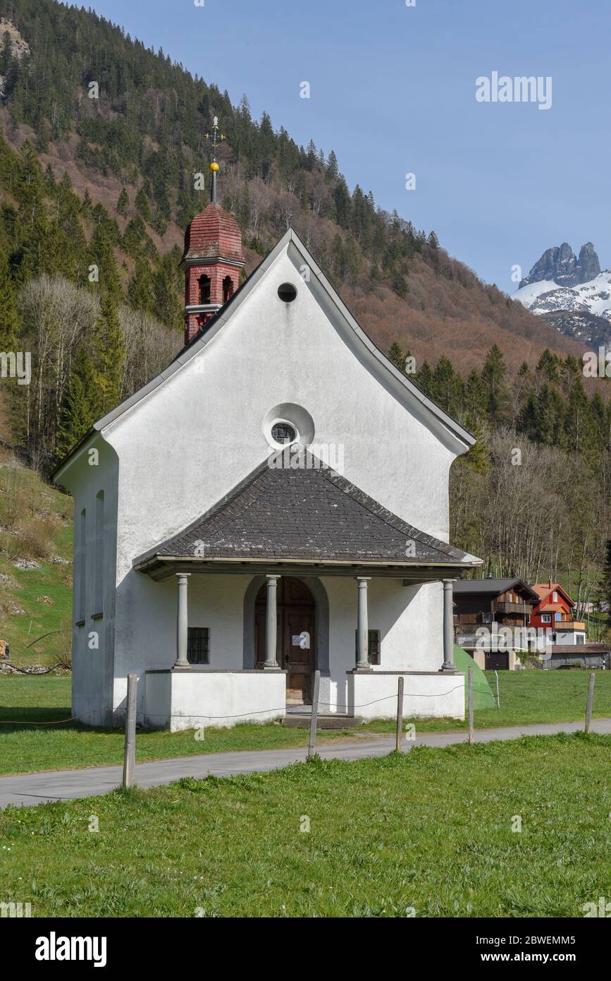 Small church on the valley of Engelberg in the Swiss alps Stock Photo ...