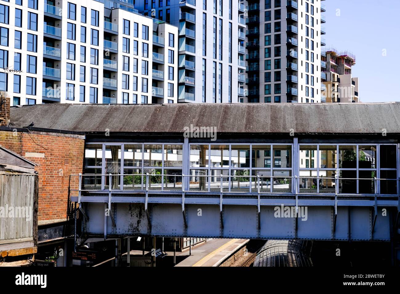 Modern Developmment Of Luxury New Build Apartments Against An Old