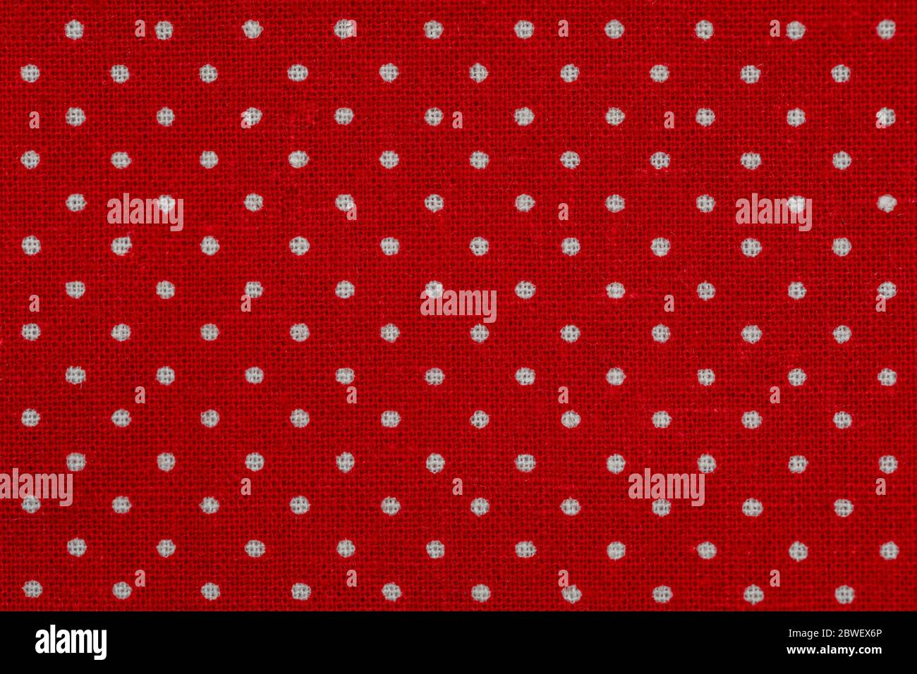 Red fabric with white polka dots. Top view, flat lay. Stock Photo