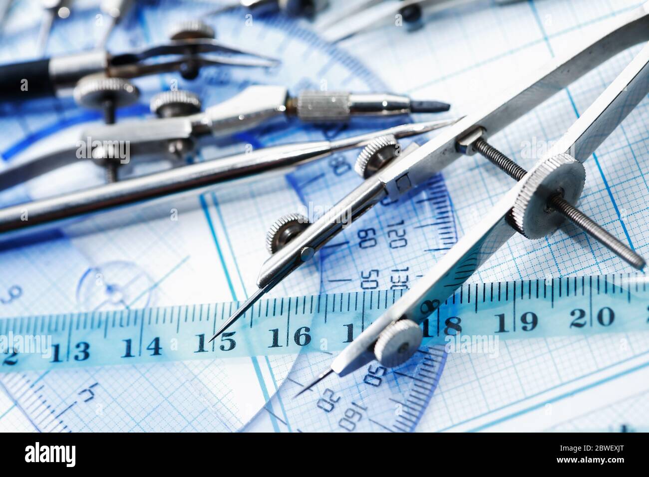 Set of old drawing tools on background with graph paper Stock Photo Alamy