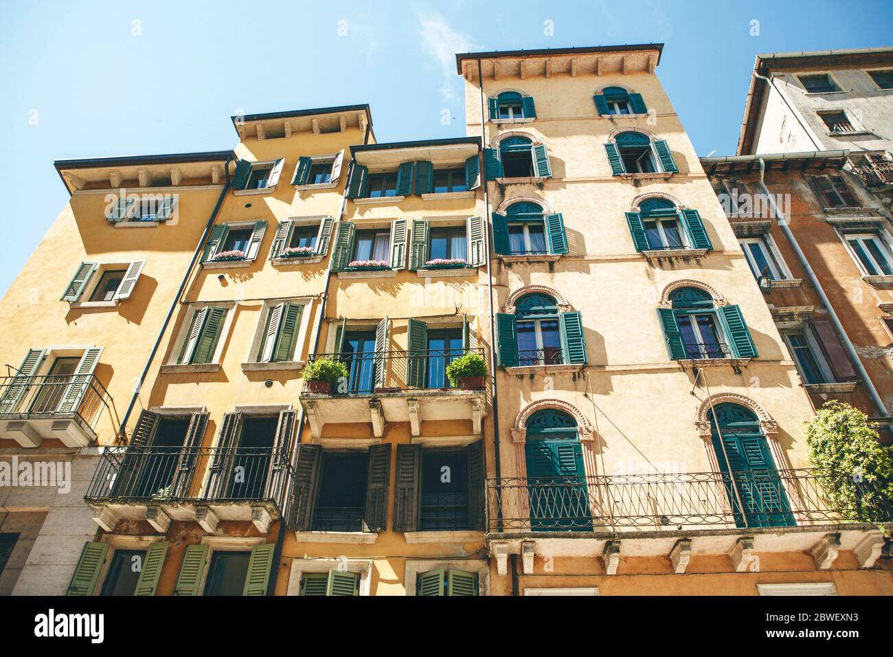 View of a traditional Italian old or retro residential building in a town square in Verona in Italy. Stock Photo