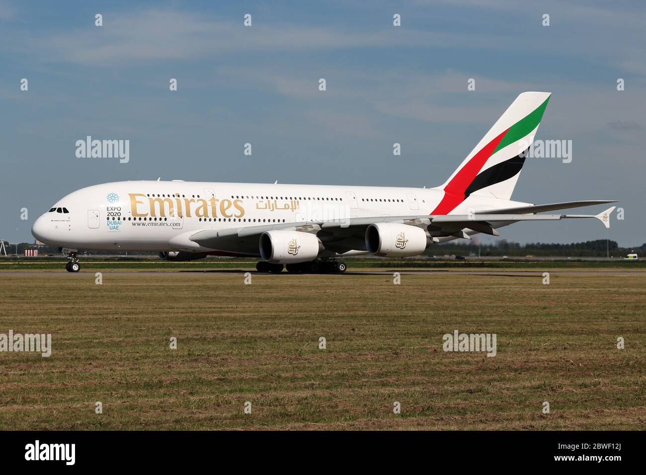 Emirates Airbus A380 with registration A6-EDV rolling on taxiway V of Amsterdam Airport Schiphol. Stock Photo