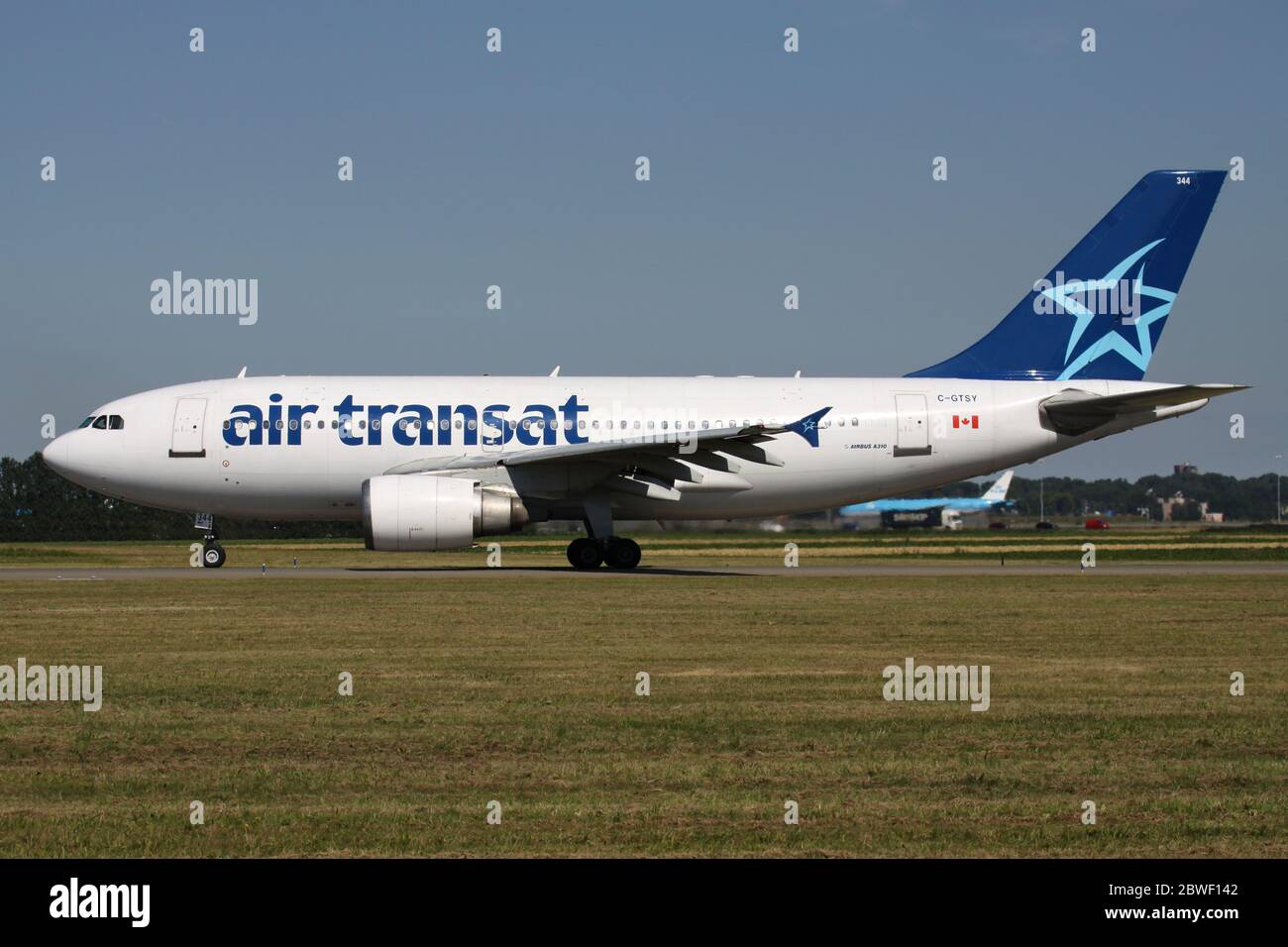 Canadian Air Transat Airbus A310-300 with registration C-GTSY rolling on taxiway V of Amsterdam Airport Schiphol. Stock Photo