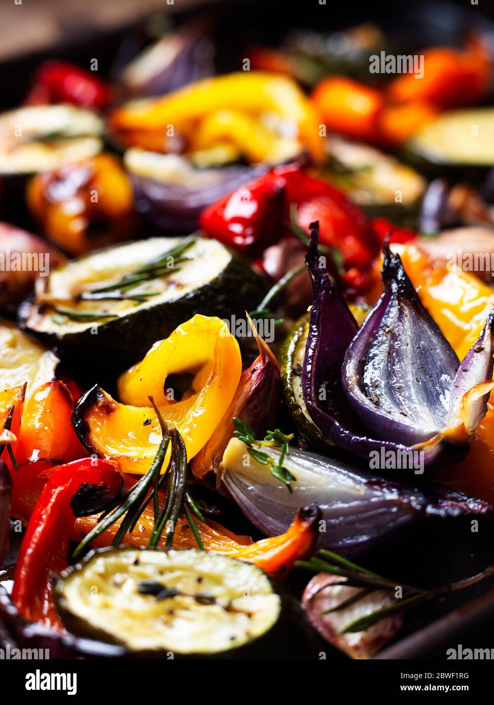 Oven Roasted Vegetables With Thyme and Rosemary Stock Photo