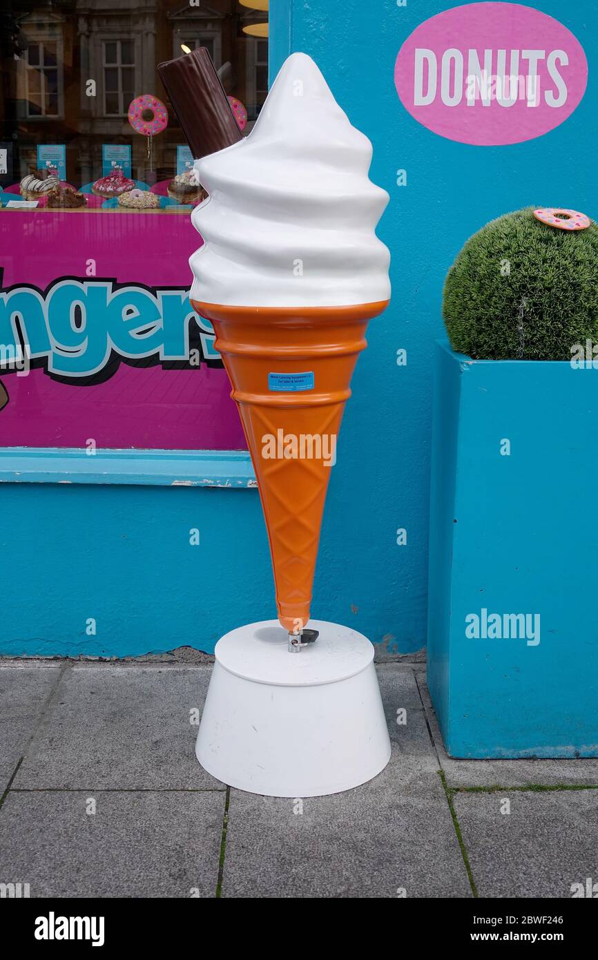 Large Plastic Ice Cream Cone Sign Outside A Donut Shop In Cork Ireland Stock Photo Alamy