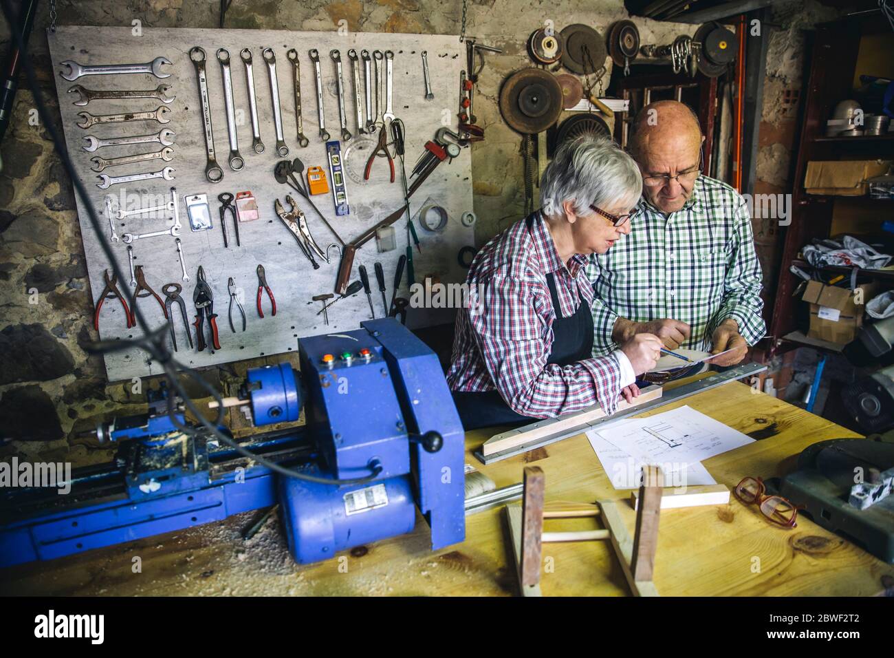 Senior couple in a carpentry Stock Photo