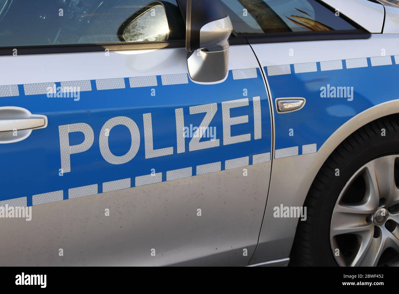 Berlin, Germany - May 06, 2020: German police inscription on a car door Stock Photo