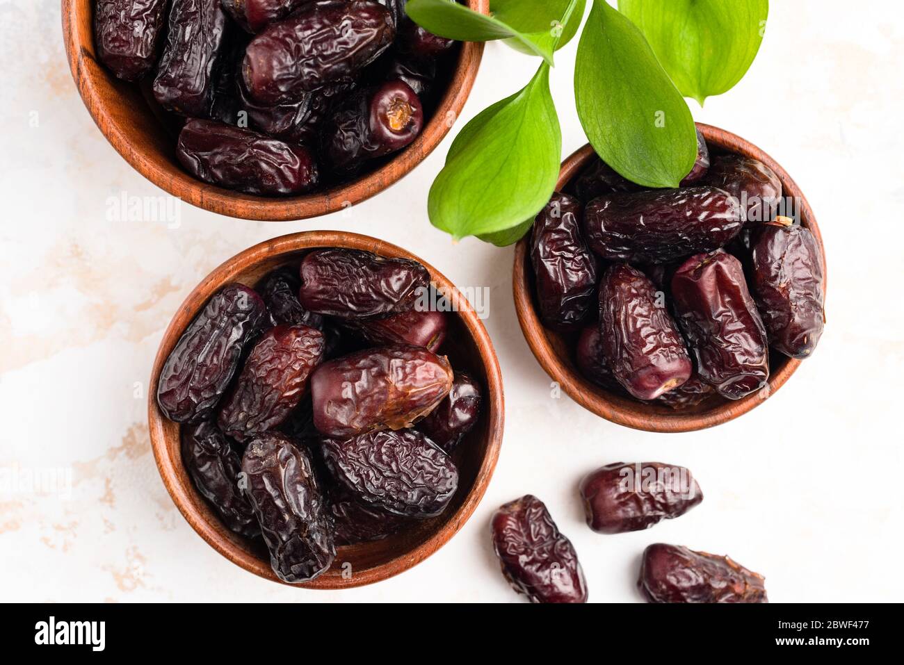 Dried Medjool Dates In Bowl Top View. Islamic Arabic Ramadan Healthy Vegan  Food Stock Photo - Alamy