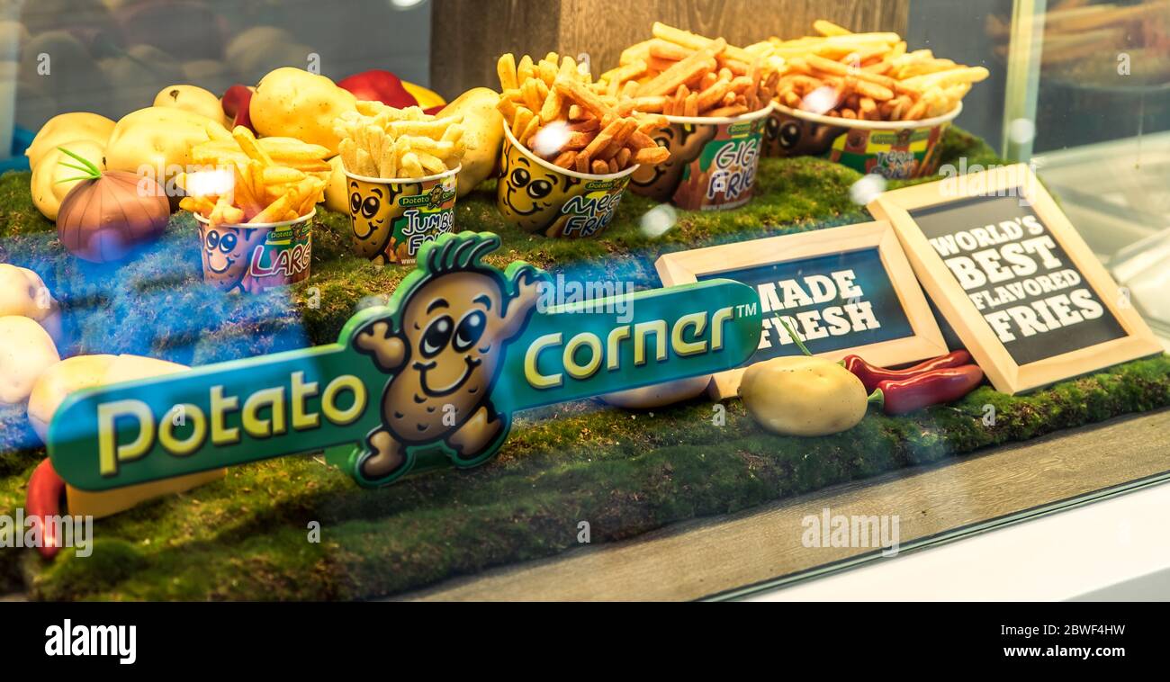 Singapore, Nov 2019: Potato Corner logo at kiosk serving flavored french fries. Asian fast food restaurant Stock Photo