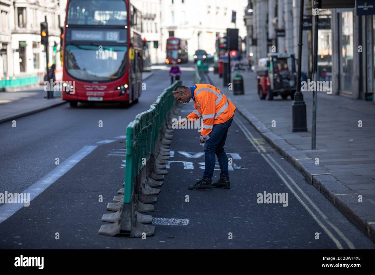 Regent Street pavements are widened for pedestrians to social distance as high streets prepare to reopen after the coronavirus lockdown, London, UK Stock Photo