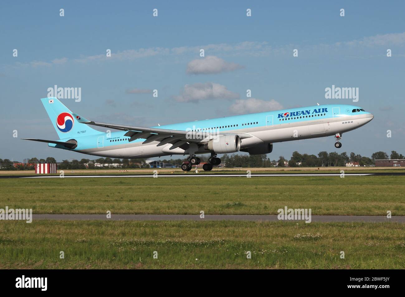 Korean Air Airbus A330-300 with registration HL7587 on short final for runway 18R (Polderbaan) of Amsterdam Airport Schiphol. Stock Photo